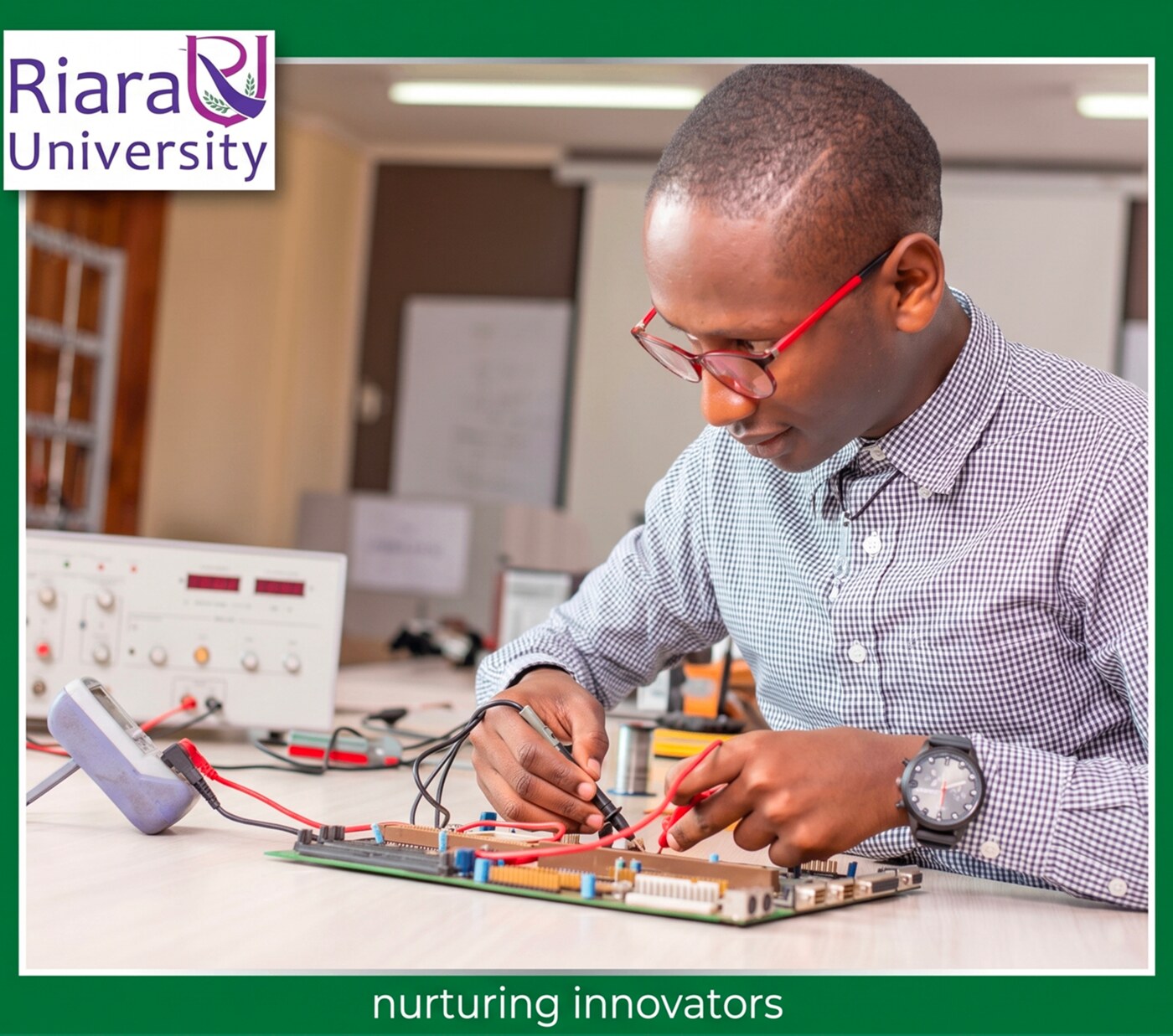 Kelvin Mutiso working on a circuit board